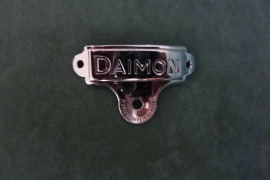 znak DAIMON na rámik svetla DAIMON reflektora STADION S11, Cena 12 €.